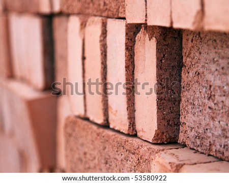Construction material: Stack of new red bricks