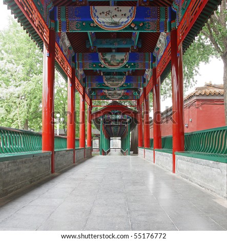 Traditional Chinese architecture: corridor in outdoor park, red pillar along the corridor