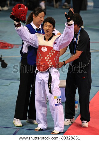 BEIJING-SEP 02: Taejin Son of Korea reacts after winning the -68 kg Men Gold-medal match during the Taekwondo competitions of the SportAccord Combat Games 2010 Beijing on Sep 02,2010 in Beijing, China