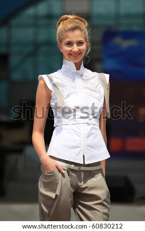 SHANGHAI-SEP 06:A model walks the runway during fashion show by Eva Brzakova, a Prague fashion designer, as a part of The Prague day events at Shanghai World Expo 2010 on Sept 06,2010 in Shanghai,China