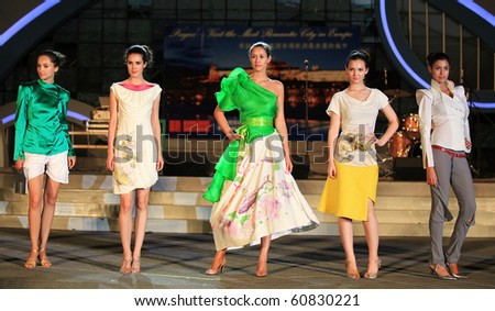 SHANGHAI-SEP 06: Models walk on the runway during fashion show by Eva Brzakova, fashion designer, as a part of The Prague day events at Shanghai World Expo 2010 on Sept 06,2010 in Shanghai, China