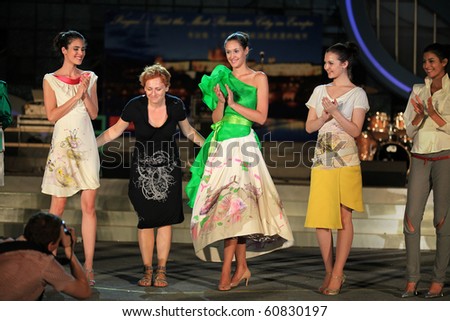 SHANGHAI-SEP 06: Models and Eva Brzakova, a famous Prague fashion designer, are seen during fashion show as a part of The Prague day events at Shanghai World Expo 2010 on Sept 06,2010 in Shanghai,China