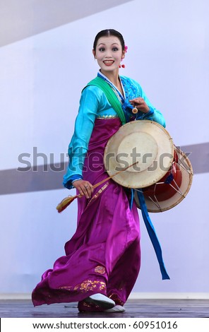 SHANGHAI - SEP 06: Pyongyang Arts Troupe performs on stage during the DPRK National Pavilion Day celebrations at Shanghai World Expo 2010 on SEP 06, 2010 in Shanghai, China