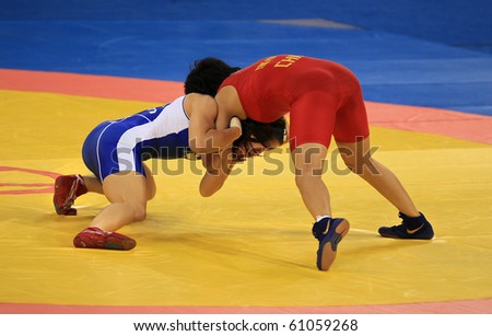 BEIJING-SEP 01: Panpan Yang of China (R) fights against Stacie Anaka of Canada (L) during the Wrestling competitions of the SportAccord Combat Games 2010 Beijing on Sep 01, 2010 in Beijing, China