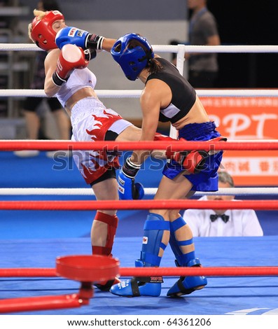 BEIJING-SEP 04: Eva Liskova of Czech Republic(R) fights against Doris Kohler of Austria during the Kickboxing competitions of the SportAccord Combat Games 2010 Beijing on Sep 04, 2010 in Beijing,China