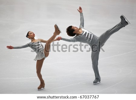 BEIJING-DEC 11: Xiaoyu Yu and Yang Jin of China perform in the Junior Pairs-Free Skating event of the ISU Grand Prix of Figure Skating Final on Dec 11, 2010 in Beijing, China.
