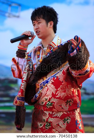 BEIJING-FEB 4: A folk artist performs on stage during the Spring Festival Temple Fair at Ditan Park on Feb 4, 2011 in Beijing, China, on the second day of the Chinese New Year, the year of the rabbit