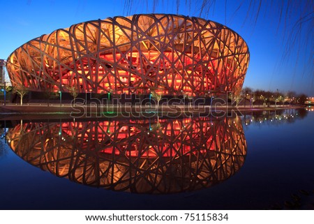 BEIJING - MARCH 26: Beijing National Stadium, also known as the Bird\'s Nest, at dusk on March 26, 2011 in Beijing, China. The 2015 World Championships in Athletics will take place at this famous venue