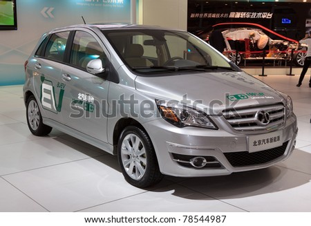 BEIJING-MAY 20: BAIC C30DB, all electric car, is on display at  the 14th China Beijing International High-tech Expo (CHITEC) on May 20, 2011 in Beijing, China. CHITEC is a major National hi-tech Expo