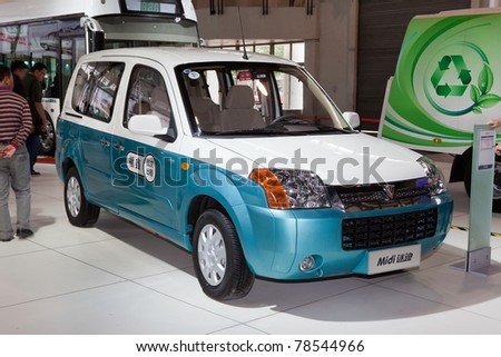 BEIJING-MAY 20: An electric taxi is on display at the 14th China Beijing International High-tech Expo (CHITEC) on May 20, 2011 in Beijing, China. CHITEC is a major National hi-tech Expo.