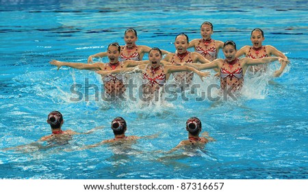 BEIJING - APRIL 24: Beijing Water Cube team of China competes in the group A Free Combination Final during the China Synchronised Swimming Open 2011 on Apr 24, 2011 in Beijing, China.