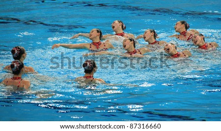 BEIJING - APRIL 24: Beijing Water Cube team of China competes in the group A Free Combination Final during the China Synchronised Swimming Open 2011 on Apr 24, 2011 in Beijing, China.