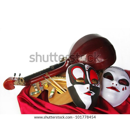 Attributes of arts: music, painting, theater. Masks, palette, brushes, drapery, lute
