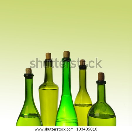 Five wine bottles  on  yellow background
