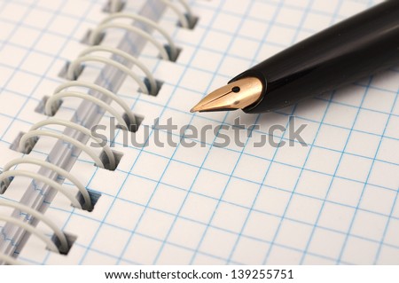 Note paper with pen