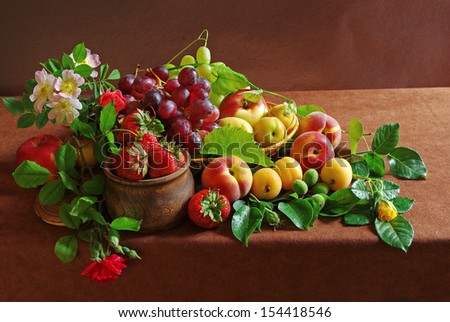 Fresh fruits and flowers  in the basket