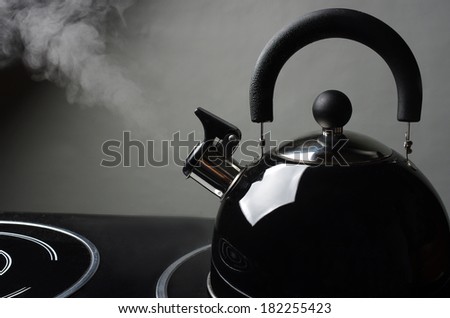 Tea kettle  with boiling water.