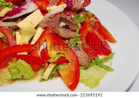Salad with vegetables, cheese and meet