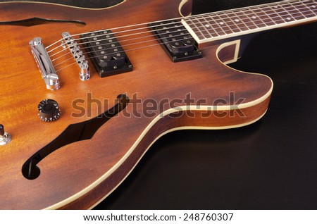 Jazz guitar on black