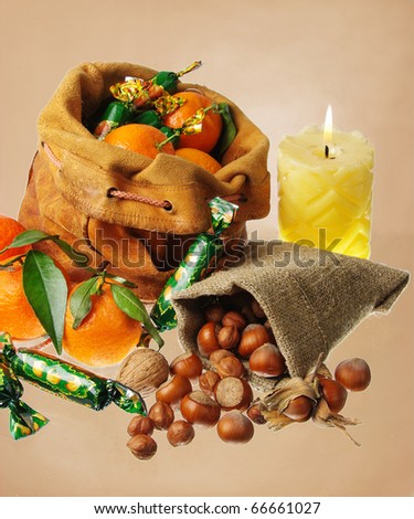 Presents of St. Nikolaus. Nuts, tangerines, candies in the Bag
