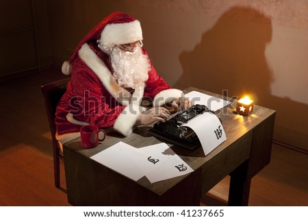 Santa Claus working by the desk, writing on a typewriter