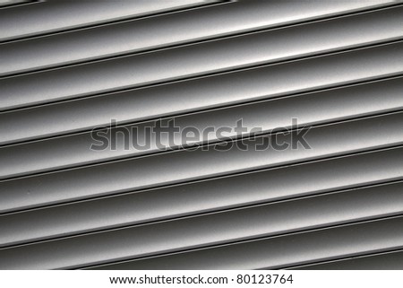 Metal window blinds as stripe pattern