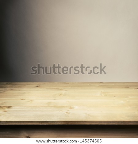 Wooden Table In Front Of Wall