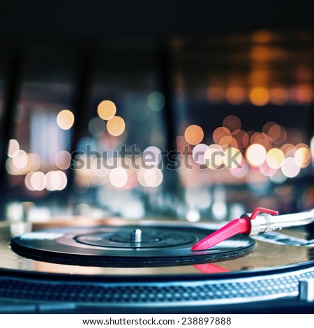 Vinyl record spinning on DJ turntable