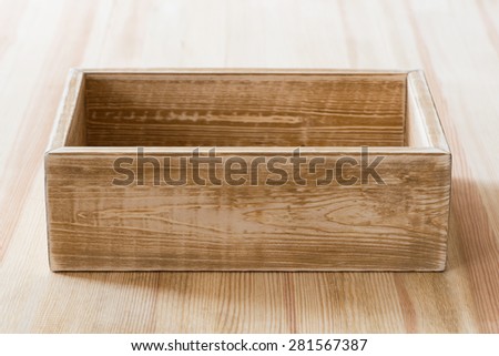 Empty rustic wooden box on the table