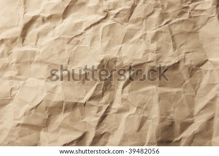 Crinkled sheet of old brown paper.