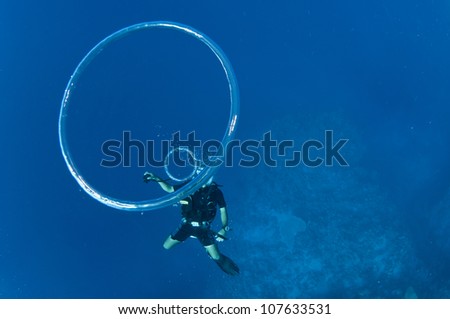 big bubble ring from scuba diver