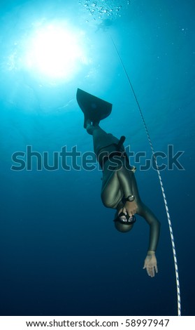 free diver with mono fin