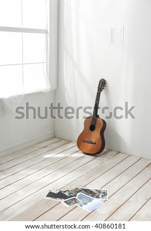 Classic guitar stand with shadow\
\
in interior