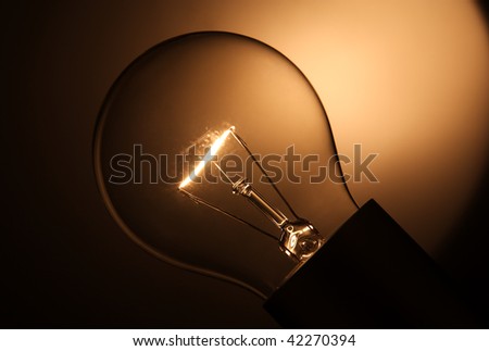 In darkness lights light bulb