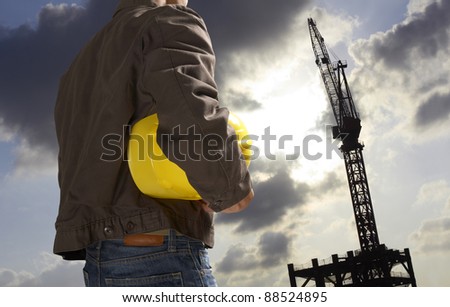 construction worker with building silhouette