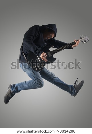 guitar player jumps