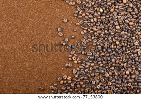 Composition with coffee beans and grounded coffee.Studio background.