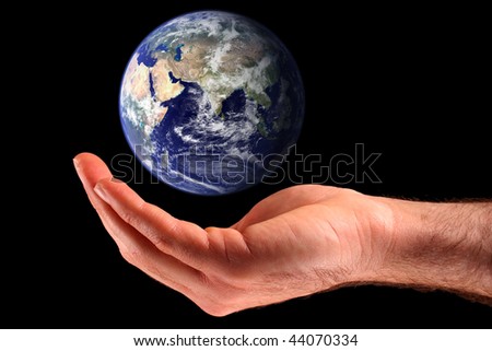 Cupping the Earth. Earth image courtesy of NASA Visible Earth: http://visibleearth.nasa.gov