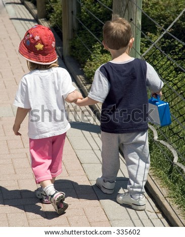 Holding Hands While Walking. girl holding hands while