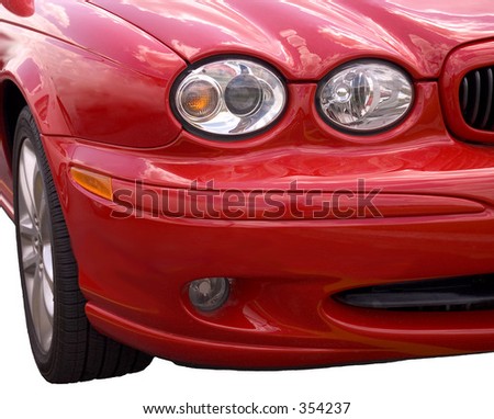 Front end of a red spots car isolated over white background