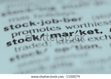 Extreme macro or close up of the word STOCK MARKET. Very shallow depth of field is intentional and shows only the word stock market in focus.