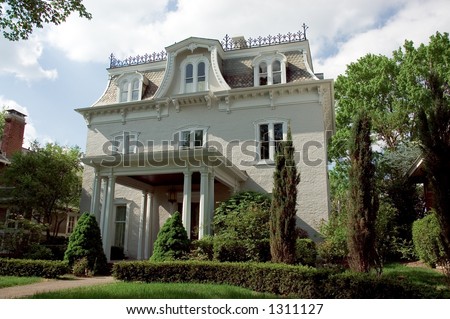 Italianate style or Second Empire architectural style house. Its distinctive Mansard roof sets it off. This home is loacted in historic Lancaster Ohio.