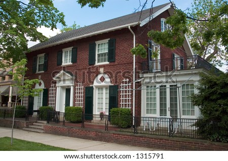 Red brick Colonial Architecture style. This beautiful home is located in the historic Lancaster Ohio.