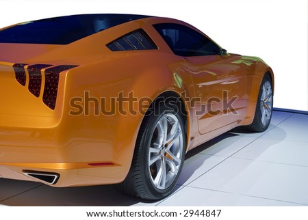 Brand new sports car. Partially isolated on a white background, with clipping paths. Look in my gallery for more car photos like this.