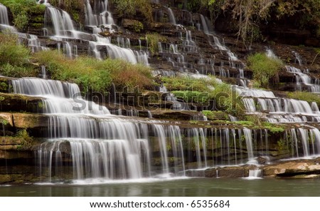 A amazingly beautiful series of cascades down a gorge wall. The water source is an underground cavern which pours the water out the side of the gorge wall.