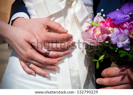 hands newly married about wedding rings