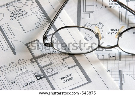 Laser printouts of architectural plan drawings with glasses
