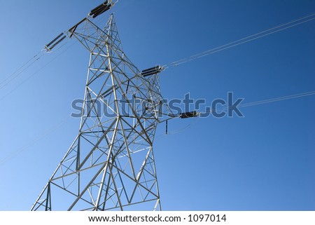 A power line towers above the ground