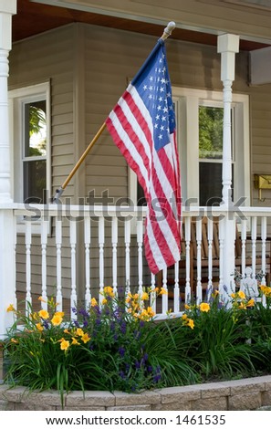 All American house flying the flag for Independence Day