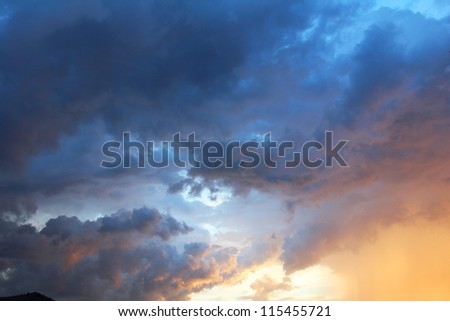 Sunset with rain clouds in Bangkok, Thailand.